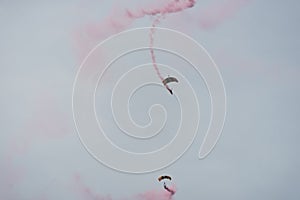 Parachutist in the sky on a cloudy day