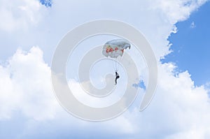 Parachutist in the sky