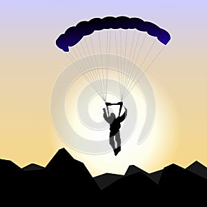 Parachutist of sunrise photo