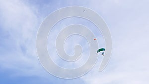 Parachutists Fly on a Paraglider Against Background of Blue Sky with Clouds. 4K