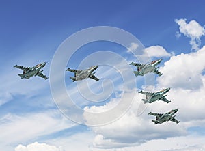 . Parade flight of aviation in the sky over Moscow. Group of Su-25 `Grach` attack aircraft