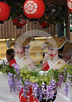 Parade of flowery Geisha girls at Gion festival