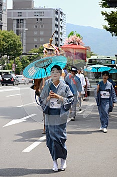 Parade of flowery girls at Gion festival, Kyoto Japan