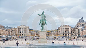 Parade ground of the castle of Versailles with the equestrian statue of Louis XIV timelapse.