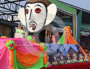 The parade of the Phi Khon ghost during the Elephant Festival