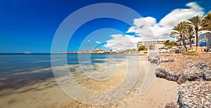 Paradise beach in Ibiza island with blue sky