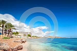 Paradise beach in Ibiza island with blue sky