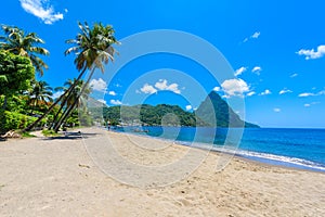 Paradise beach at Soufriere Bay with view to Piton at small town Soufriere in Saint Lucia, Tropical Caribbean Island photo