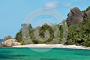 Paradise beach and welcoming rock.