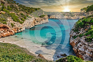 Paradise Calo des Moro Beach in Majorca Mallorca, Spain during sunset