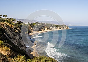 Paradise Cove Malibu, Zuma Beach, emerald and blue water in a quite paradise beach surrounded by cliffs. Malibu, Los Angeles, LA, photo