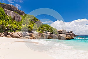 Amazing tropical beach with granite boulders on Grande Soeur Island, Seychelles photo