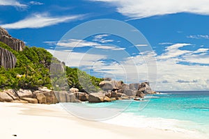 Amazing tropical beach with granite boulders on Grande Soeur Island, Seychelles photo