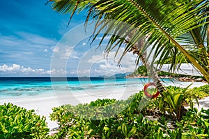 Paradise Petite Anse beach on Mahe island, Seychelles. High season holiday vacation background