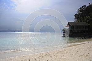 Paradise sea landscape with white sand and emerald ocean shore in Rawa Island Malaysia