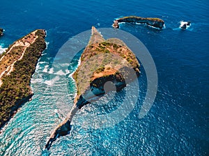 Paradise view with blue ocean and island in Nusa Penida. Aerial view