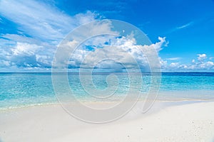 Paradise white sand beach and blue sky in sandbank island, Maldives