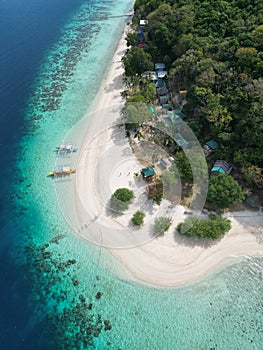 paradisiac island with blue sea