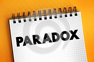 Paradox is a logically self-contradictory statement or a statement that runs contrary to one\'s expectation, text concept on photo