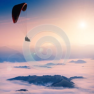 Paraglide in a morning sky