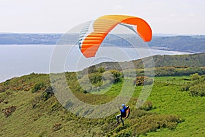 Paraglider above the coast