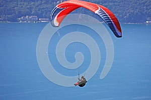 Paraglider above a lake