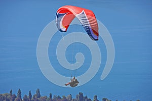 Paraglider above lake Annecy