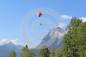 Paraglider above Lake Annecy in the French Alps