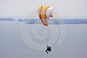 Paraglider above the sea