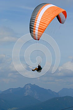 Paraglider in the Alps sky