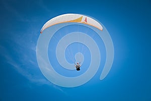 Paraglider at Baltic Sea, blue sky