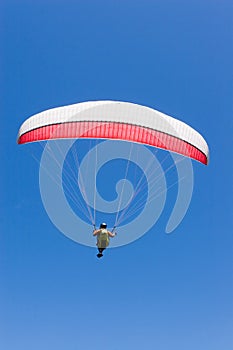 Paraglider Flies Into the Blue