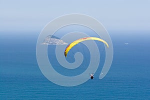Paraglider Flies Over Ocean