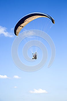 Paraglider flying above Mediterranean