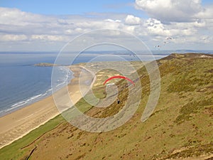 Paraglider at Rhossili Beach in Wales
