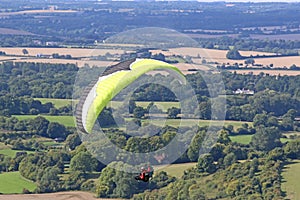Paraglider flying at Combe Gibbet, England photo
