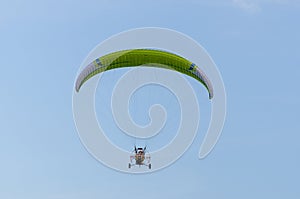 Paraglider flying free in the sky