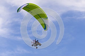 Paraglider flying free in the sky