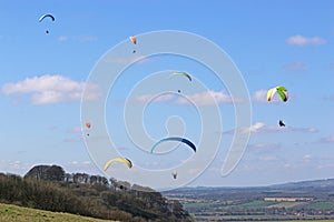 Paragliders flying at Combe Gibbet, England photo