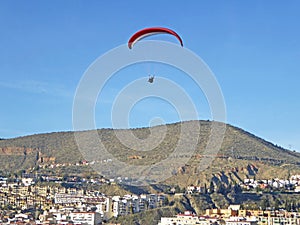 Paraglider landing at Cenes de la Vega in Spain