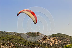 Paraglider landing in a special zone at Cleopatra Beach in Alanya Turkey