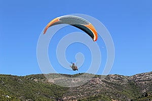 Paraglider landing in a special zone at Cleopatra Beach in Alanya Turkey