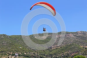 Paraglider landing in a special zone at Cleopatra Beach in Alanya Turkey