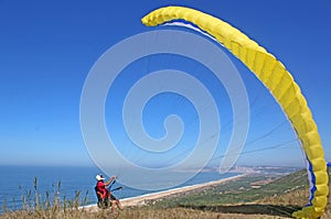 Paraglider launching at Salgado, Portugal