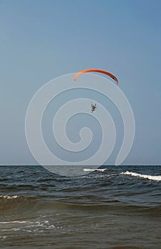 Paraglider over the ocean