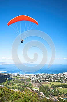 Paraglider ridge soaring next