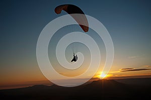 Paraglider in sunset