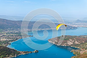 Paragliders above Lake Annecy, in autumn, in Haute Savoie, France