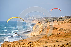 Paragliders on the coast