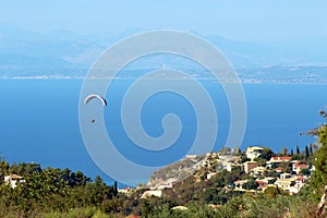 Paragliders flying over the city of Nidri, Lefkada